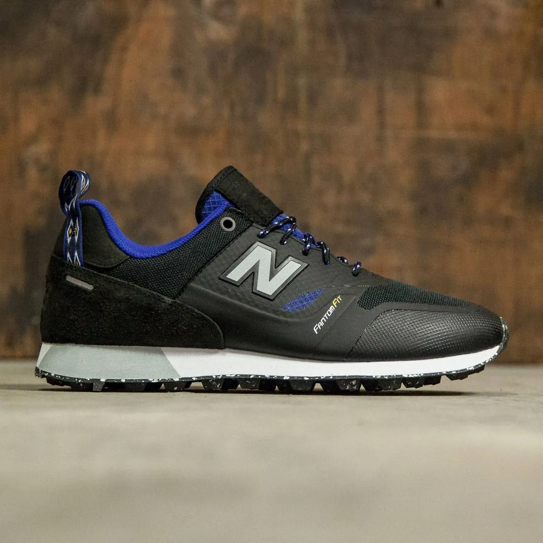 New Balance Men Trailbuster Re-Engineered TBTFOB (black / uv blue)