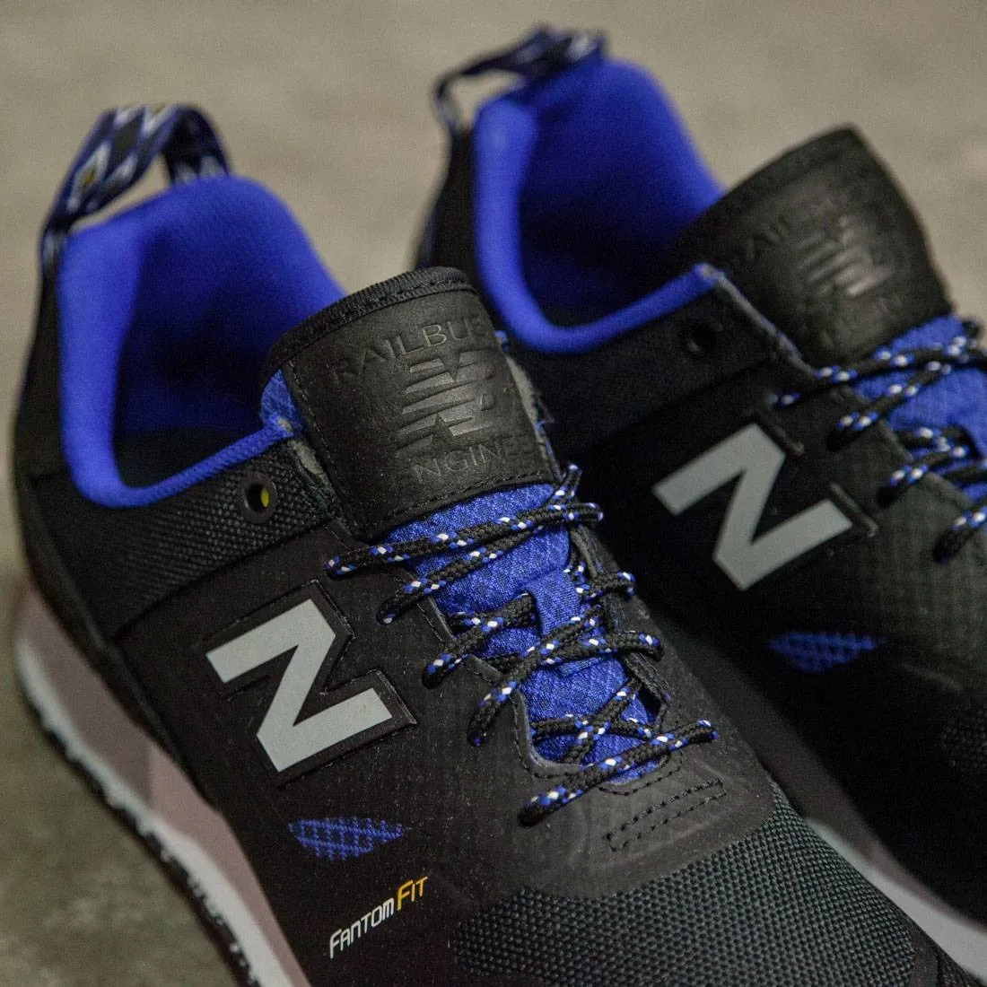 New Balance Men Trailbuster Re-Engineered TBTFOB (black / uv blue)