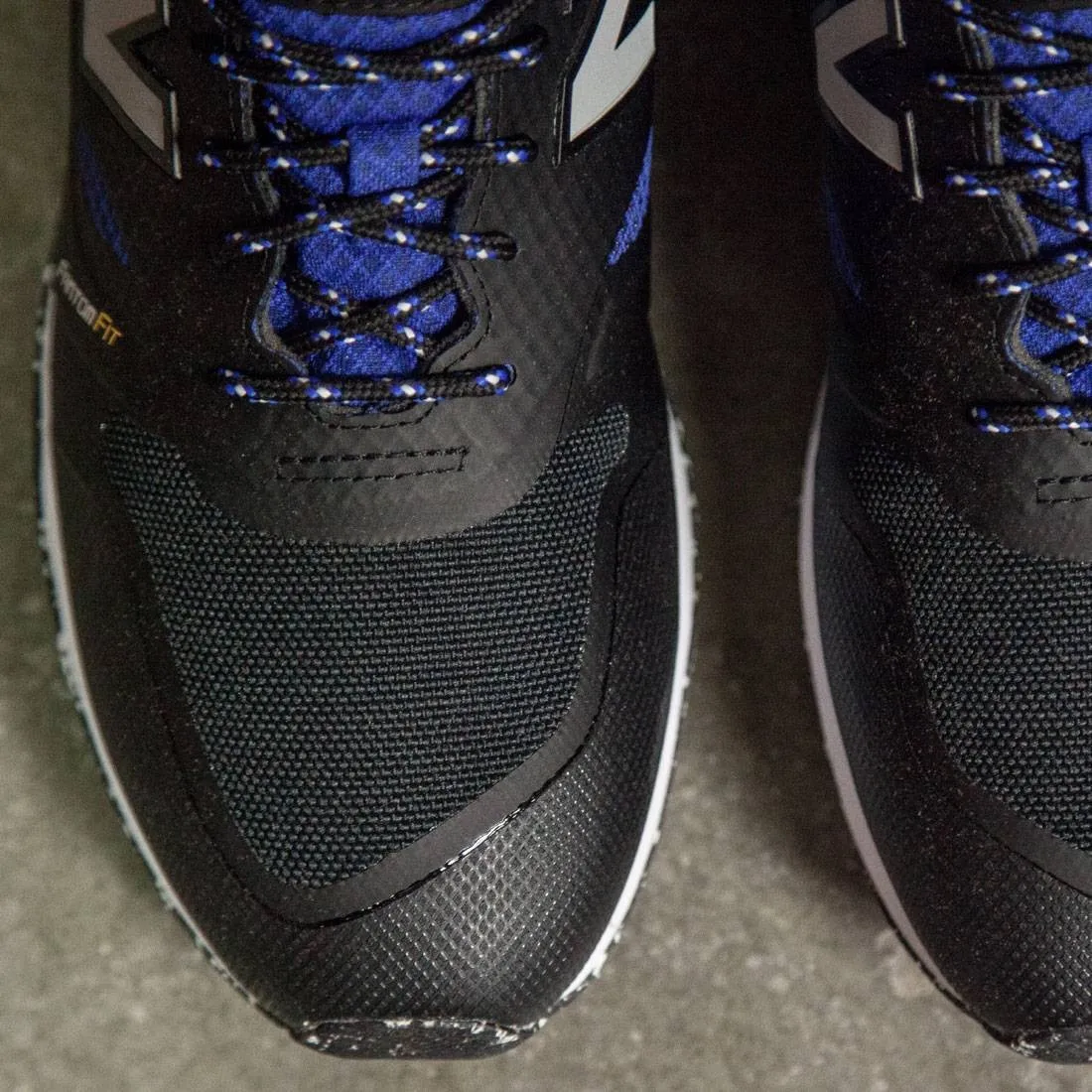 New Balance Men Trailbuster Re-Engineered TBTFOB (black / uv blue)