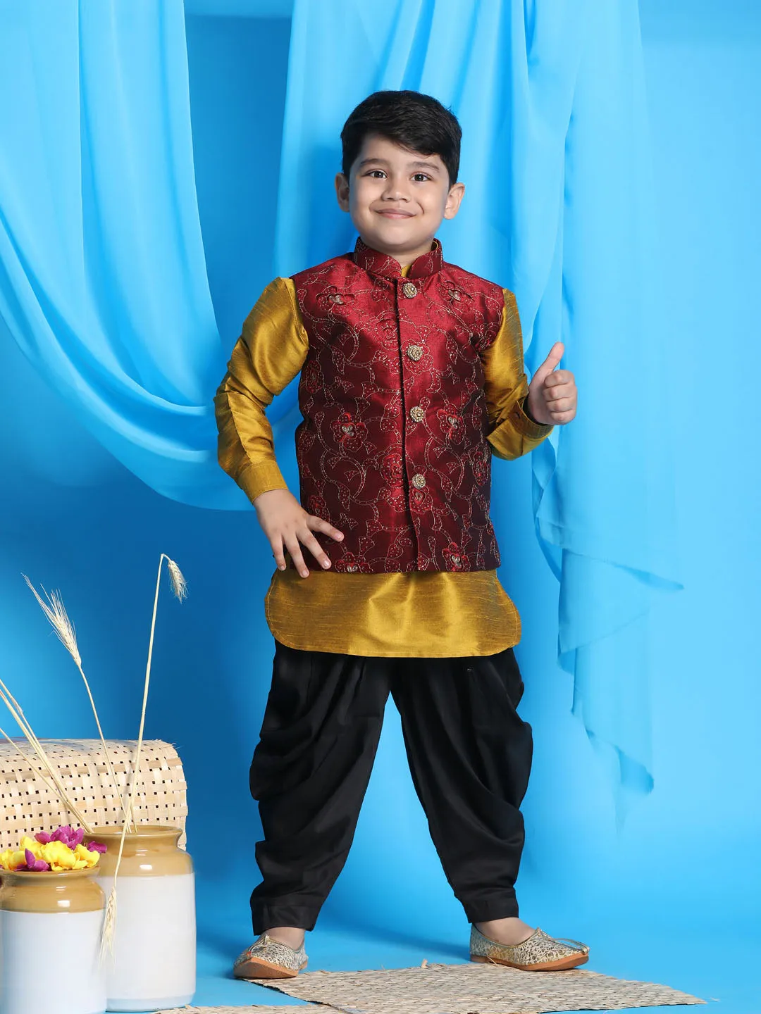 Vastramay Boy's Maroon Embroidered Nehru Jacket With Mustard Kurta And Black Dhoti Set